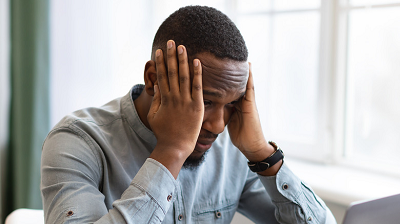 Person with a headache.